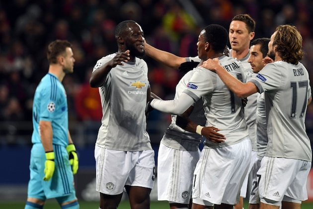 Manchester United's forward from Belgium Romelu Lukaku (2nd L) celebrates with teammates after scoring his team's third goal as CSKA Moscow's goalkeeper from Russia Igor Akinfeev walks past during the UEFA Champions League Group A football match between PFC CSKA Moscow and Manchester United FC in Moscow on September 27, 2017. / AFP PHOTO / Kirill KUDRYAVTSEV        (Photo credit should read KIRILL KUDRYAVTSEV/AFP/Getty Images)