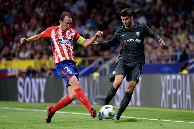 MADRID, SPAIN - SEPTEMBER 27:   Diego Godin, #2 of Atletico de Madrid and Alvaro Morata, #9 of Chelsea FC during the UEFA Champions League group C match between Club Atletico de Madrid and  Chelsea FC at Wanda Metropolitano on September 27, 2017 in Madrid, Spain. (Photo by Sonia Canada/Getty Images)