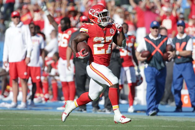 CARSON, CA - SEPTEMBER 24: Running back Kareem Hunt #27 of the Kansas City Chiefs carries the ball for a touchdown against the Los Angeles Chargers in the fourth quarter at StubHub Center on September 24, 2017 in Carson, California. The Chiefs defeated the Chargers 24-10. (Photo by Jeff Gross/Getty Images)