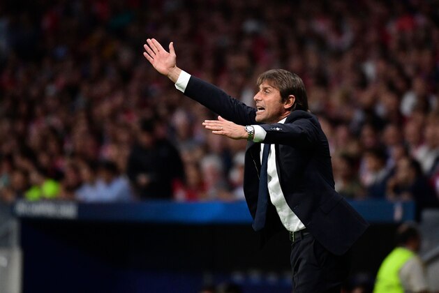 Chelsea's Italian head coach Antonio Conte gestures during the UEFA Champions League Group C football match Club Atletico de Madrid vs Chelsea FC at the Metropolitan stadium in Madrid on September 27, 2017. / AFP PHOTO / PIERRE-PHILIPPE MARCOU        (Photo credit should read PIERRE-PHILIPPE MARCOU/AFP/Getty Images)