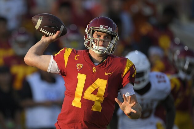 FILE - In this Saturday, Sept. 16, 2017, file photo, Southern California quarterback Sam Darnold throws during the first half of an NCAA college football game against Texas, in Los Angeles. Darnold ranks 42nd in the country in passer efficiency rating (148.35), with seven interceptions and nine touchdown passes. (AP Photo/Mark J. Terrill, File)