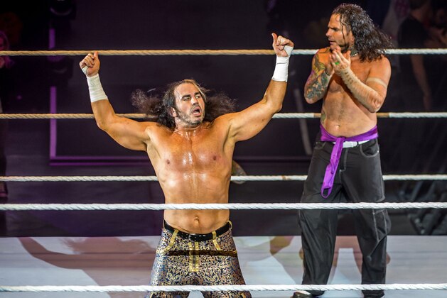 The Hardy Boyz celebrate victory in the ring during WWE show at Zenith Arena on May 10, 2017 in Lille, northern France. / AFP PHOTO / PHILIPPE HUGUEN        (Photo credit should read PHILIPPE HUGUEN/AFP/Getty Images)