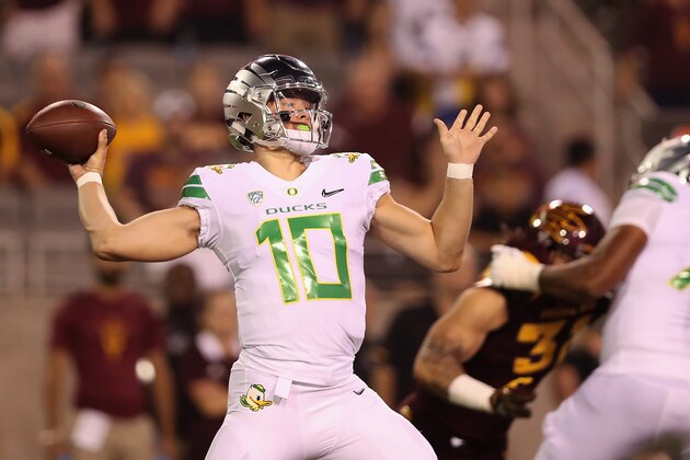 TEMPE, AZ - SEPTEMBER 23:  Quarterback Justin Herbert #10 of the Oregon Ducks throws a pass during the first half of the college football game against the Arizona State Sun Devils at Sun Devil Stadium on September 23, 2017 in Tempe, Arizona.  (Photo by Christian Petersen/Getty Images)