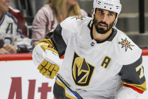 Las Vegas Golden Knights defenseman Jason Garrison skates during warm-ups before the start of a preseason hockey game between the Colorado Avalanche and the Las Vegas Golden Knights Tuesday, Sept. 19, 2017, in Denver. (AP Photo/Jack Dempsey)