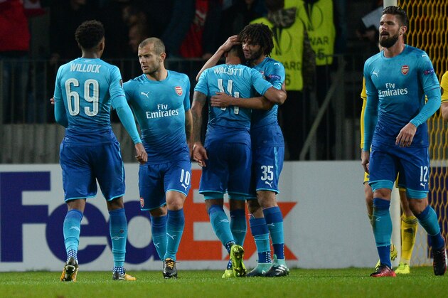 Arsenal's forward from England Theo Walcott (C) celebrates with teammates after scoring a goal during the UEFA Europa League Group H football match between FC BATE Borisov and Arsenal FC in Borisov, outside Minsk, on September 28, 2017. / AFP PHOTO / Maxim MALINOVSKY (Photo credit should read MAXIM MALINOVSKY/AFP/Getty Images) Arsenal's forward from England Theo Walcott (C) celebrates with teammates after scoring a goal during the UEFA Europa League Group H football match between FC BATE Borisov and Arsenal FC in Borisov, outside Minsk, on September 28, 2017. / AFP PHOTO / Maxim MALINOVSKY (Photo credit should read MAXIM MALINOVSKY/AFP/Getty Images)
