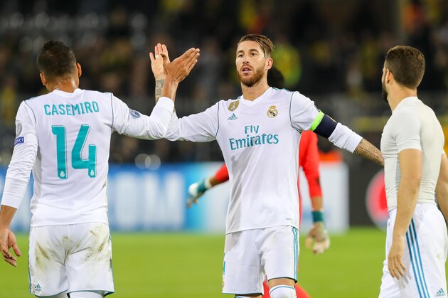DORTMUND, GERMANY - SEPTEMBER 26: Casemiro of Real Madrid shakes hands with Sergio Ramos of Real Madrid l during the UEFA Champions League group H match between Borussia Dortmund and Real Madrid at Signal Iduna Park on September 26, 2017 in Dortmund, Germany. (Photo by TF-Images/TF-Images via Getty Images)