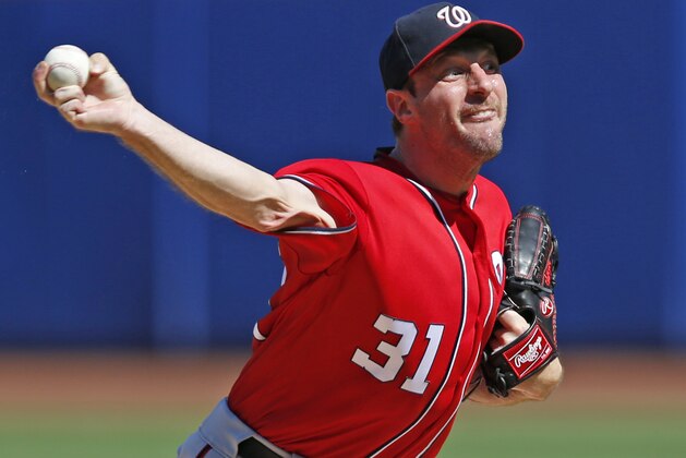 Washington Nationals starting pitcher Max Scherzer delivers during the first inning of a baseball game against the New York Mets, Sunday, Sept. 24, 2017, in New York. (AP Photo/Kathy Willens)