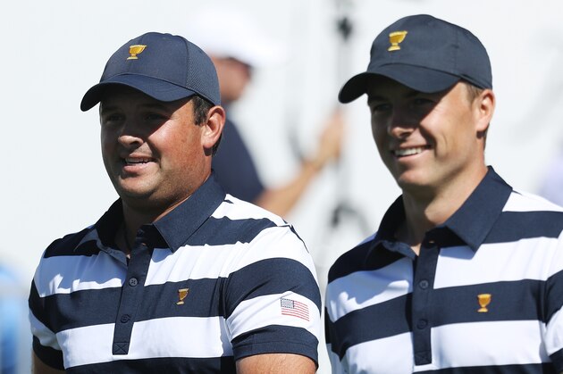 JERSEY CITY, NJ - SEPTEMBER 28:  Patrick Reed and Jordan Spieth of the U.S. Team walk on the first hole as they play against Emiliano Grillo of Argentina and the International Team and Si Woo Kim of South Korea and the International Team during Thursday foursome matches of the Presidents Cup at Liberty National Golf Club on September 28, 2017 in Jersey City, New Jersey.  (Photo by Rob Carr/Getty Images)