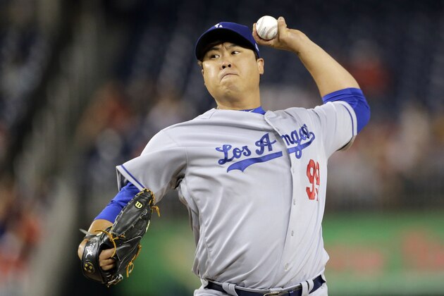 Los Angeles Dodgers starting pitcher Hyun-Jin Ryu throws during the first inning of a baseball game against the Washington Nationals, Sunday, Sept. 17, 2017, in Washington. (AP Photo/Mark Tenally)