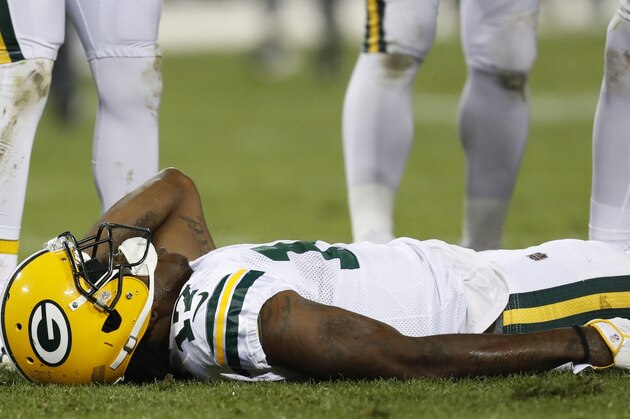 Green Bay Packers' Davante Adams lays on the field after being hit in the head during the second half of an NFL football game against the Chicago Bears Thursday, Sept. 28, 2017, in Green Bay, Wis. Adams left the game on a stretcher. (AP Photo/Matt Ludtke)