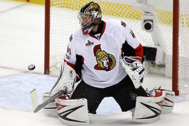 Ottawa Senators goalie Craig Anderson (41) blocks a shot against the Pittsburgh Penguins during the first period of Game 7 of the Eastern Conference final in the NHL Stanley Cup hockey playoffs in Pittsburgh, Thursday, May 25, 2017. (AP Photo/Gene J. Puskar)