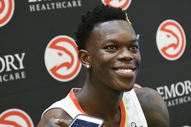 Guard Dennis Schroder of Germany takes questions during the Atlanta Hawks basketball media day, Monday, Sept. 25, 2017, in Atlanta. (AP Photo/John Amis)