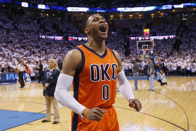 Oklahoma City Thunder guard Russell Westbrook (0) roars to the crowd before Game 4 of a first-round NBA basketball playoff series against the Houston Rockets in Oklahoma City, Sunday, April 23, 2017. (AP Photo/Sue Ogrocki)