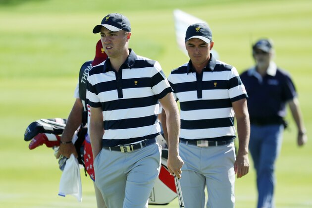 JERSEY CITY, NJ - SEPTEMBER 28: Justin Thomas of the U.S. Team and Rickie Fowler of the U.S. Team walk on the eighth hole during Thursday foursome matches of the Presidents Cup at Liberty National Golf Club on September 28, 2017 in Jersey City, New Jersey. (Photo by Rob Carr/Getty Images) JERSEY CITY, NJ - SEPTEMBER 28: Justin Thomas of the U.S. Team and Rickie Fowler of the U.S. Team walk on the eighth hole during Thursday foursome matches of the Presidents Cup at Liberty National Golf Club on September 28, 2017 in Jersey City, New Jersey. (Photo by Rob Carr/Getty Images)