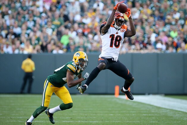 GREEN BAY, WI - SEPTEMBER 24:  A.J. Green #18 of the Cincinnati Bengals makes a catch past Kevin King #20 of the Green Bay Packers in the fourth quarter at Lambeau Field on September 24, 2017 in Green Bay, Wisconsin.  (Photo by Dylan Buell/Getty Images)