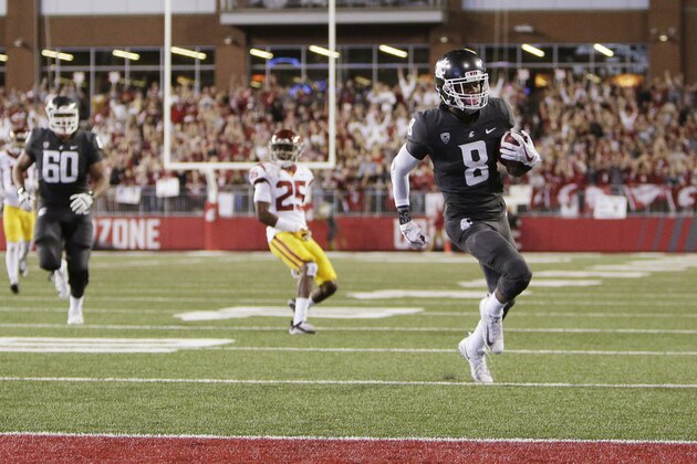Washington State wide receiver Tavares Martin Jr. (8) runs for a touchdown during the first half of an NCAA college football game against Southern California in Pullman, Wash., Friday, Sept. 29, 2017. (AP Photo/Young Kwak)