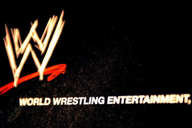 NEW YORK - MARCH 18:  The World Wrestling Entertainment logo hangs on a wall at a media conference announcing the all-star lineup of WWE WrestleMania XIX at ESPN Zone in Times Square March 18, 2003 in New York City.  (Photo by Mark Mainz/Getty Images)