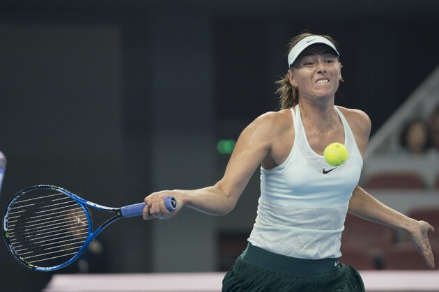 BEIJING, CHINA - SEPTEMBER 30:  Maria Sharapova of Russia returns a shot during the  Anastasija Sevastova of Latvia on day one of the 2017 China Open at the China National Tennis Centre on September 30, 2017 in Beijing, China.  (Photo by XIN LI/Getty Images)