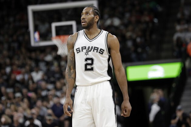 San Antonio Spurs forward Kawhi Leonard (2) watches during the first half in a second-round NBA playoff series basketball game against the Houston Rockets, Monday, May 1, 2017, in San Antonio. (AP Photo/Eric Gay)