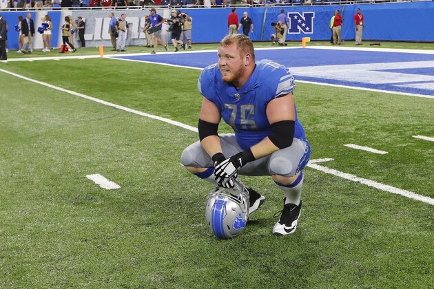 Detroit Lions offensive guard T.J. Lang (76) reacts to a Golden Tate touchdown being overturned against the Atlanta Falcons during an NFL football game in Detroit, Sunday, Sept. 24, 2017. Atlanta won 30-26. (AP Photo/Paul Sancya)