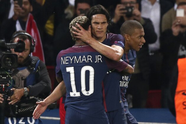 PSG's Edinson Cavani celebrates with teammate Neymar during the Champions League Group B soccer match between Paris Saint-Germain and Bayern Munich in Paris, France, Wednesday, Sept. 27, 2017. (AP Photo/Thibault Camus)
