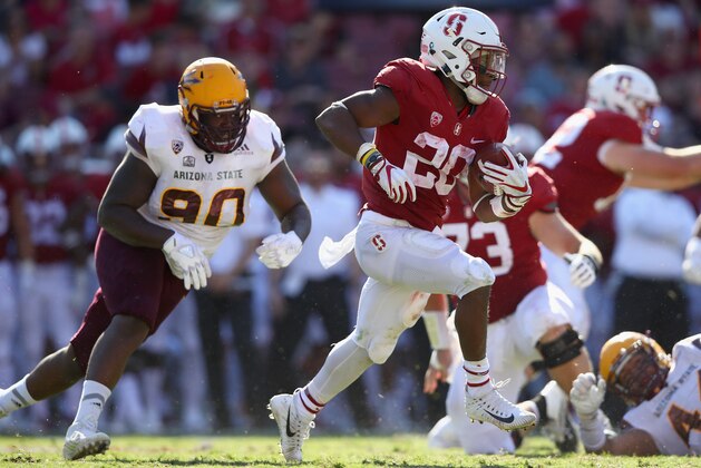 PALO ALTO, CA - SEPTEMBER 30:  Bryce Love #20 of the Stanford Cardinal runs with the ball against the Arizona State Sun Devils at Stanford Stadium on September 30, 2017 in Palo Alto, California.  (Photo by Ezra Shaw/Getty Images)