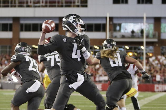 Washington State quarterback Luke Falk (4) throws a pass during the second half of an NCAA college football game against Southern California in Pullman, Wash., Friday, Sept. 29, 2017. Washington State won 30-27. (AP Photo/Young Kwak)