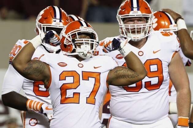 Clemson running back C.J. Fuller (27) celebrates a touchdown during the first half of an NCAA college football game against Virginia Tech in Blacksburg, Va., Saturday, Sept. 30, 2017. (AP Photo/Steve Helber)
