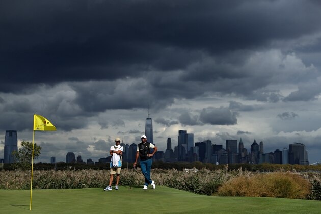 JERSEY CITY, NJ - SEPTEMBER 30: Jason Day of the International team looks on during Saturday four-ball matches of the Presidents Cup at Liberty National Golf Club on September 30, 2017 in Jersey City, New Jersey. (Photo by Patrick Smith/Getty Images)