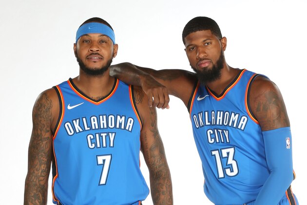 OKLAHOMA CITY, OK - SEPTEMBER 25: Carmelo Anthony #7 and Paul George #13 of the Oklahoma City Thunder pose for a portrait during the 2017 NBA Media Day on September 25, 2017 at the Chesapeake Energy Arena in Oklahoma City, Oklahoma. NOTE TO USER: User expressly acknowledges and agrees that, by downloading and or using this Photograph, user is consenting to the terms and conditions of the Getty Images License Agreement. Mandatory Copyright Notice: Copyright 2017 NBAE (Photo by Layne Murdoch/NBAE via Getty Images)