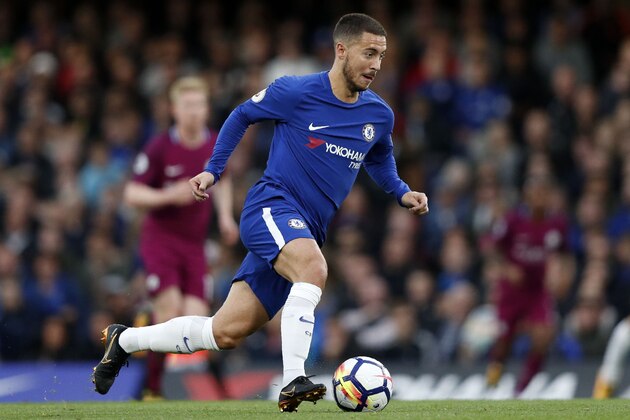 Chelsea's Belgian midfielder Eden Hazard runs with the ball during the English Premier League football match between Chelsea and Manchester City at Stamford Bridge in London on September 30, 2017. / AFP PHOTO / Adrian DENNIS / RESTRICTED TO EDITORIAL USE. No use with unauthorized audio, video, data, fixture lists, club/league logos or 'live' services. Online in-match use limited to 75 images, no video emulation. No use in betting, games or single club/league/player publications.  /         (Photo credit should read ADRIAN DENNIS/AFP/Getty Images)