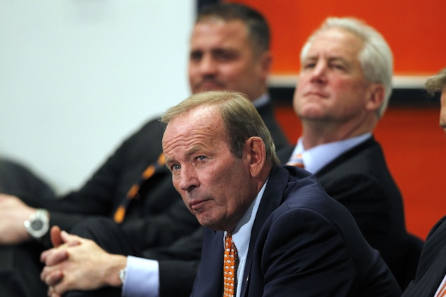 Denver Broncos owner Pat Bowlen, front, joins head coach John Fox, center, and general manager Brian Xanders in listening as quarterback Peyton Manning addreses reporters during a news conference at the team's headquarters in Englewood, Colo., on Tuesday, March 20, 2012. (AP Photo/David Zalubowski) Denver Broncos owner Pat Bowlen, front, joins head coach John Fox, center, and general manager Brian Xanders in listening as quarterback Peyton Manning addreses reporters during a news conference at the team's headquarters in Englewood, Colo., on Tuesday, March 20, 2012. (AP Photo/David Zalubowski)