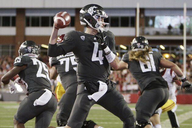 Washington State quarterback Luke Falk (4) throws a pass during the second half of an NCAA college football game against Southern California in Pullman, Wash., Friday, Sept. 29, 2017. Washington State won 30-27. (AP Photo/Young Kwak)