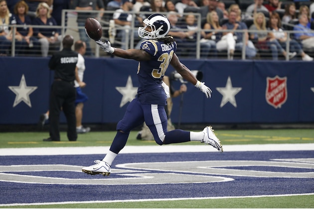 Los Angeles Rams running back Todd Gurley (30) celebrates reaching the end zone for a touchdown in the second half of an NFL football game against the Dallas Cowboys on Sunday, Oct. 1, 2017, in Arlington, Texas. (AP Photo/Michael Ainsworth)