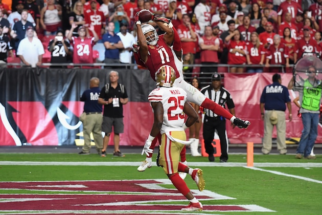 GLENDALE, AZ - OCTOBER 01: Wide receiver Larry Fitzgerald #11 of the Arizona Cardinals makes the game winning catch in the end zone during overtime in the NFL game against the San Francisco 49ers at the University of Phoenix Stadium on October 1, 2017 in Glendale, Arizona.  (Photo by Norm Hall/Getty Images)