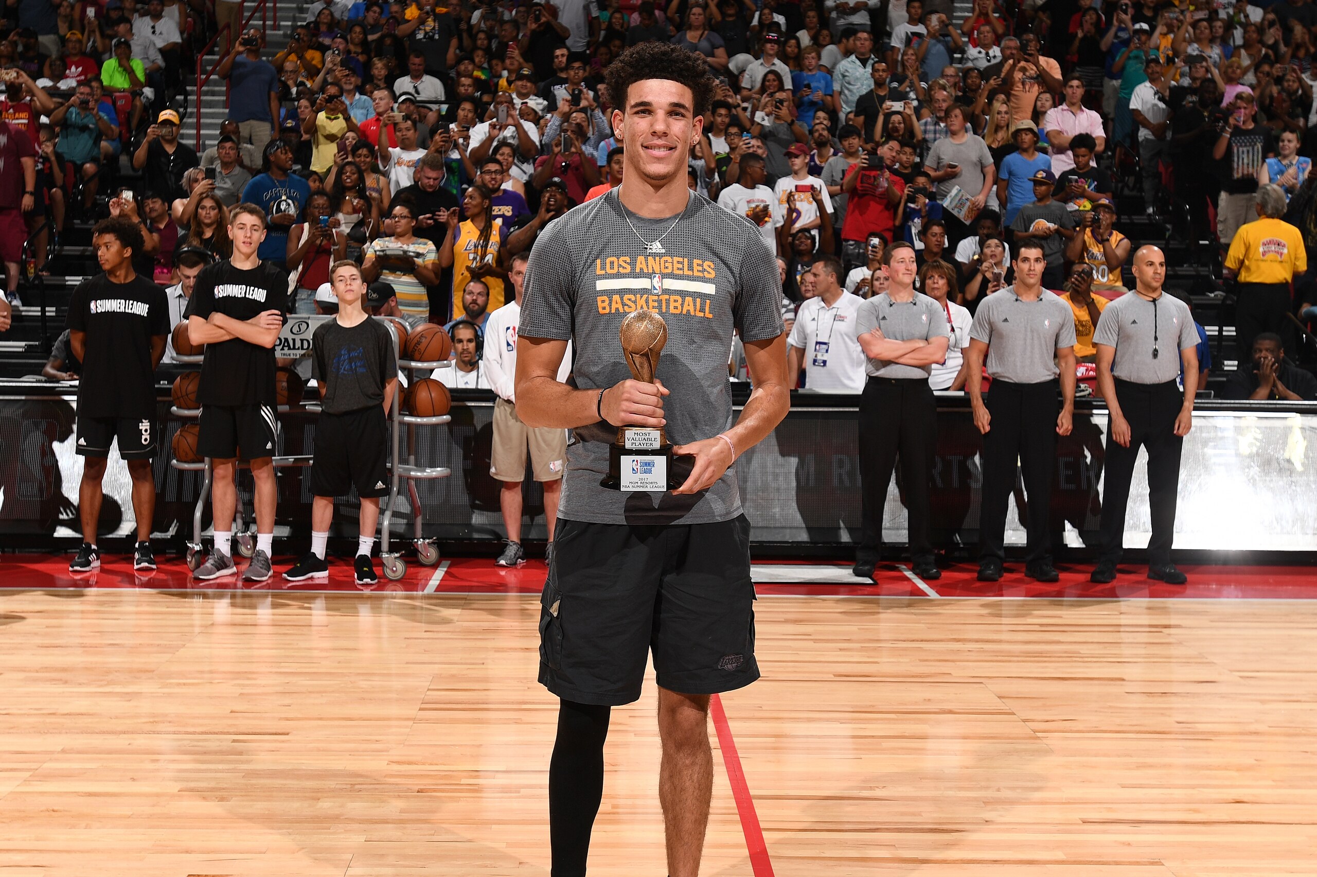 LAS VEGAS, NV - JULY 17: Lonzo Ball #2 of the Los Angeles Lakers receives the MGM Resorts NBA Summer League MVP Award before the game against the Portland Trail Blazers during the 2017 Summer League Finals on July 17, 2017 at the Thomas & Mack Center in Las Vegas, Nevada. NOTE TO USER: User expressly acknowledges and agrees that, by downloading and/or using this Photograph, user is consenting to the terms and conditions of the Getty Images License Agreement. Mandatory Copyright Notice: Copyright 2017 NBAE (Photo by Garrett Ellwood/NBAE via Getty Images)