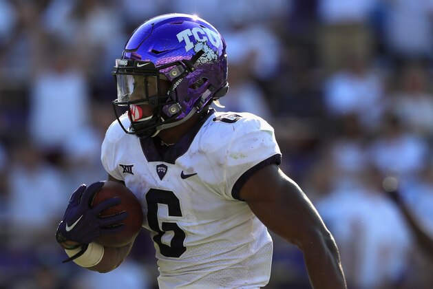 FORT WORTH, TX - SEPTEMBER 16:  Darius Anderson #6 of the TCU Horned Frogs runs the ball for a touchdown against the Southern Methodist Mustangs in the second half at Amon G. Carter Stadium on September 16, 2017 in Fort Worth, Texas.  (Photo by Ronald Martinez/Getty Images)