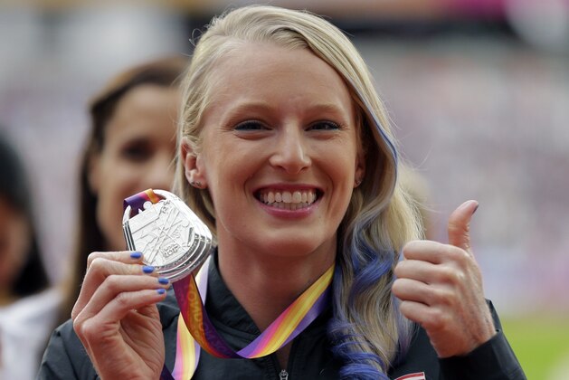 United States' Sandi Morris shows off her silver medal after the ceremony for the women's pole vault final during the World Athletics Championships in London Monday, Aug. 7, 2017. (AP Photo/Alastair Grant)