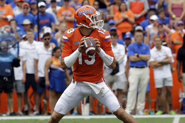 Florida quarterback Feleipe Franks looks for a receiver against Vanderbilt during the first half of an NCAA college football game, Saturday, Sept. 30, 2017, in Gainesville, Fla. (AP Photo/John Raoux)