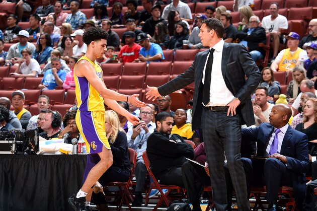 ANAHEIM, CA - SEPTEMBER 30: Luke Walton of the Los Angeles Lakers high fives Lonzo Ball #2 of the Los Angeles Lakers during the game against the Minnesota Timberwolves during the preseason game on September 30, 2017 at Honda Center in Anaheim, California. NOTE TO USER: User expressly acknowledges and agrees that, by downloading and/or using this Photograph, user is consenting to the terms and conditions of the Getty Images License Agreement. Mandatory Copyright Notice: Copyright 2017 NBAE (Photo by Andrew D. Bernstein/NBAE via Getty Images)