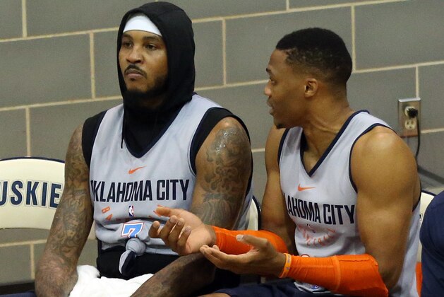 OKLAHOMA CITY, OK - OCTOBER 1: Carmelo Anthony #7 and Russell Westbrook #0 of the Oklahoma City Thunder and their team hold an open Blue/White scrimmage for fans on October 1, 2017 at Edmond North High School in Edmond, Oklahoma. NOTE TO USER: User expressly acknowledges and agrees that, by downloading and or using this Photograph, user is consenting to the terms and conditions of the Getty Images License Agreement. Mandatory Copyright Notice: Copyright 2017 NBAE (Photo by Layne Murdoch/NBAE via Getty Images)