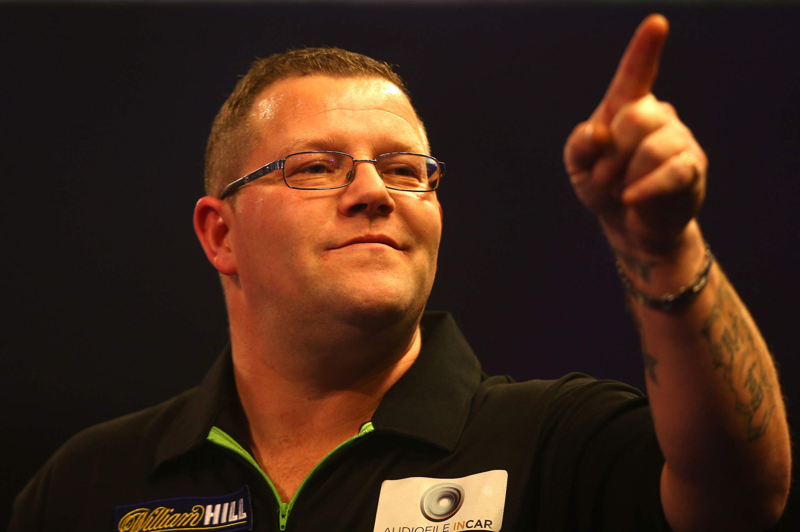 LONDON, ENGLAND - DECEMBER 19:  Steve West of England celebrates winning a set during his first round match ahainst Mervyn King of England during day five of the 2017 William Hill PDC Darts Championships at Alexandra Palace on December 19, 2016 in London, England.  (Photo by Alex Pantling/Getty Images)