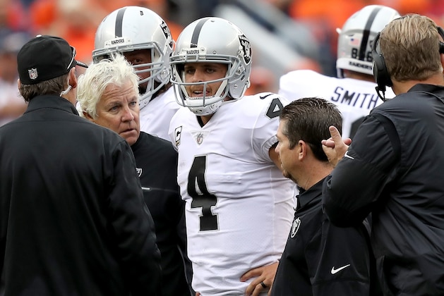 DENVER, CO - OCTOBER 01:  Quarterback Derek Carr #4 of the Oakland Raiders leaves the game with an injury against the Denver Broncos at Sports Authority Field at Mile High on October 1, 2017 in Denver, Colorado.  (Photo by Matthew Stockman/Getty Images)