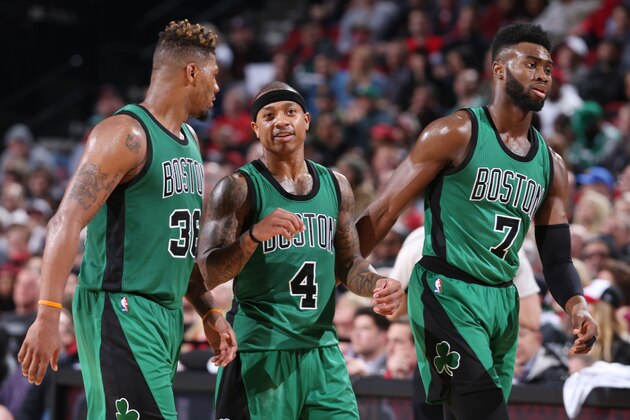 PORTLAND, OR - FEBRUARY 9: Marcus Smart #36, Isaiah Thomas #4 and Jaylen Brown #7 of the Boston Celtics are seen during the game against the Portland Trail Blazers on February 9, 2017 at the Moda Center in Portland, Oregon. NOTE TO USER: User expressly acknowledges and agrees that, by downloading and or using this Photograph, user is consenting to the terms and conditions of the Getty Images License Agreement. Mandatory Copyright Notice: Copyright 2017 NBAE (Photo by Sam Forencich/NBAE via Getty Images)