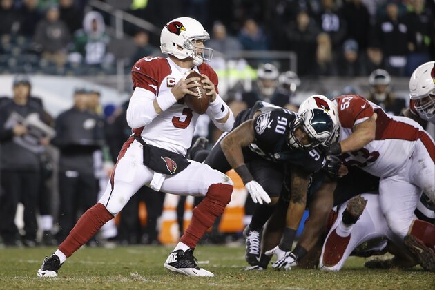 Arizona Cardinals' Carson Palmer in action during the second half of an NFL football game against the Philadelphia Eagles, Sunday, Dec. 20, 2015, in Philadelphia. (AP Photo/Matt Rourke)