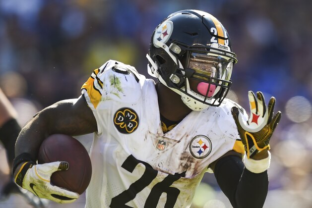 Pittsburgh Steelers running back Le'Veon Bell (26) carries the ball during the second half of an NFL football game against the Baltimore Ravens in Baltimore, Sunday, Oct. 1, 2017. (AP Photo/Gail Burton)