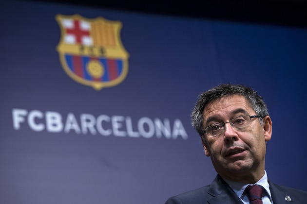 FC Barcelona's president Josep Maria Bartomeu speaks during a press conference at the Camp Nou stadium in Barcelona on October 2, 2017.
Barcelona president Josep Maria Bartomeu confirmed today two of the club's board members resigned in the wake of his decision to play a match behind closed doors after a violent crackdown by police of an independence referendum for Catalonia yesterday. / AFP PHOTO / Josep LAGO        (Photo credit should read JOSEP LAGO/AFP/Getty Images)