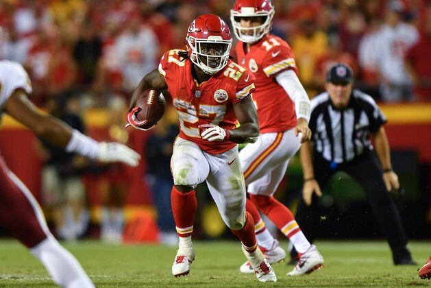 KANSAS CITY, MO - OCTOBER 2: Running back Kareem Hunt #27 of the Kansas City Chiefs rushes the ball against the Washington Redskins during the third quarter of the game against the Washington Redskins at Arrowhead Stadium on October 2, 2017 in Kansas City, Missouri. (Photo by Peter Aiken/Getty Images)