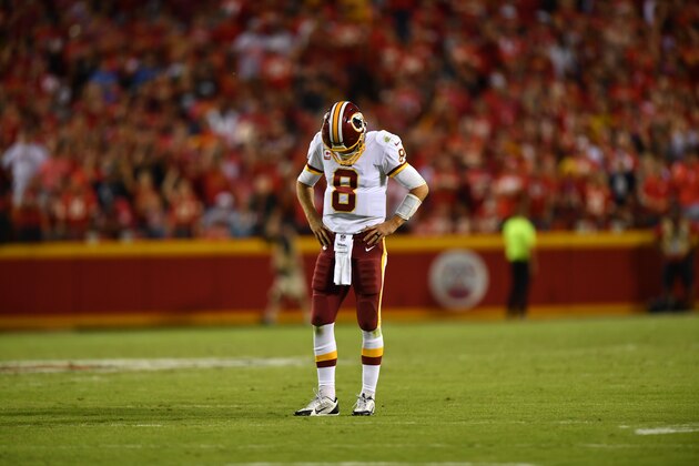 KANSAS CITY, MO - OCTOBER 2: Quarterback Kirk Cousins #8 of the Washington Redskins stands disappointed after a communication issue forced a time out during the fourth quarter of the game against the Kansas City Chiefs at Arrowhead Stadium on October 2, 2017 in Kansas City, Missouri. (Photo by Peter Aiken/Getty Images)
