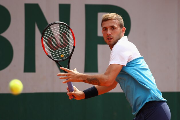 PARIS, FRANCE - MAY 28: Daniel Evans of Great Britain plays a forehand during the mens singles first round match against Tommy Robredo of Spain on day one of the 2017 French Open at Roland Garros on May 28, 2017 in Paris, France.  (Photo by Clive Brunskill/Getty Images)